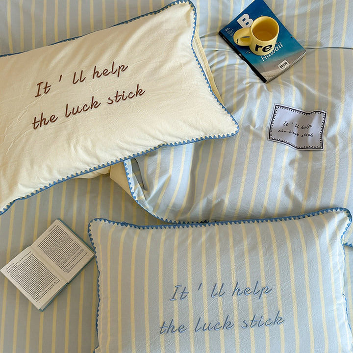 Cotton bedding set, striped, with shell hem
