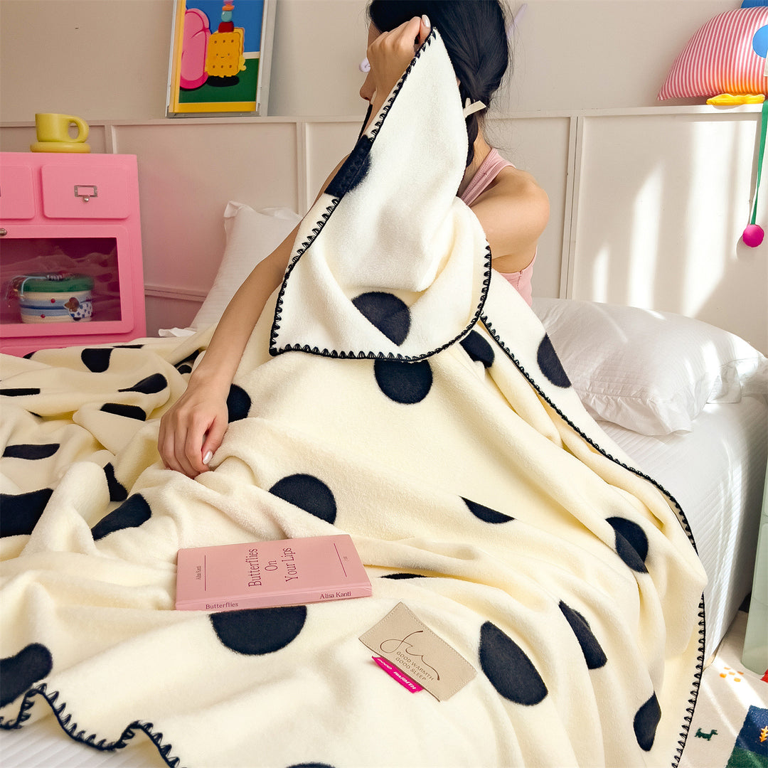 Fluffy wool blanket with wave pattern, versatile