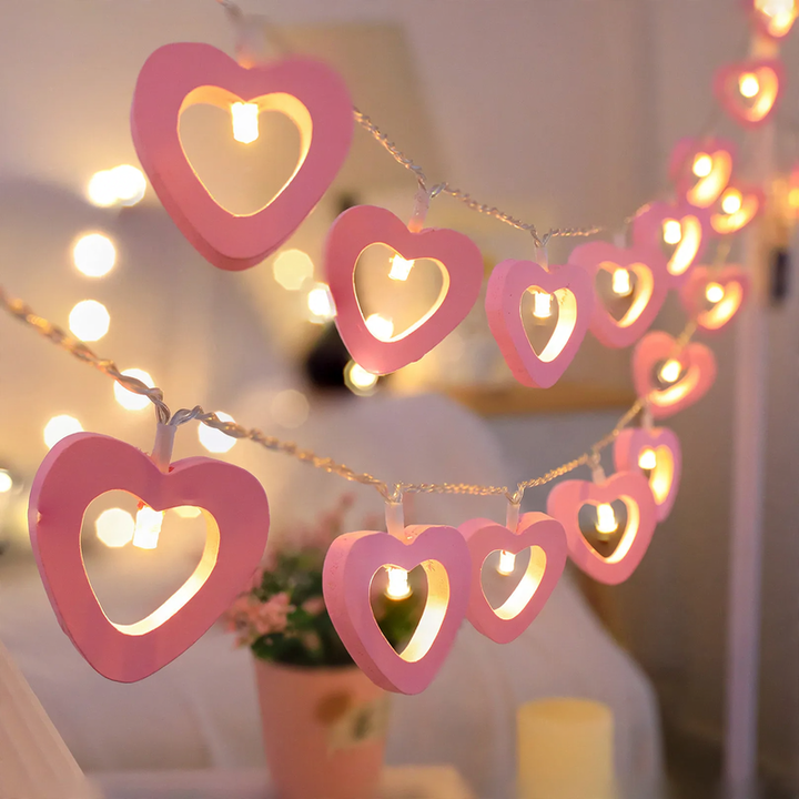 Decorative LED string lights with wooden motifs