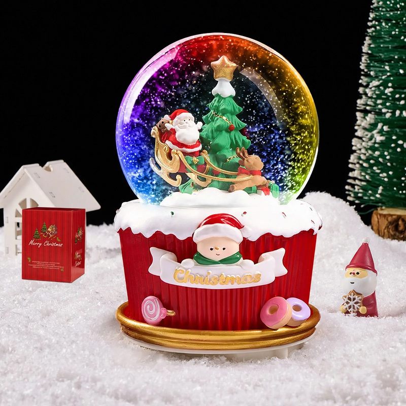 Christmas snow globe with music box and carriage design