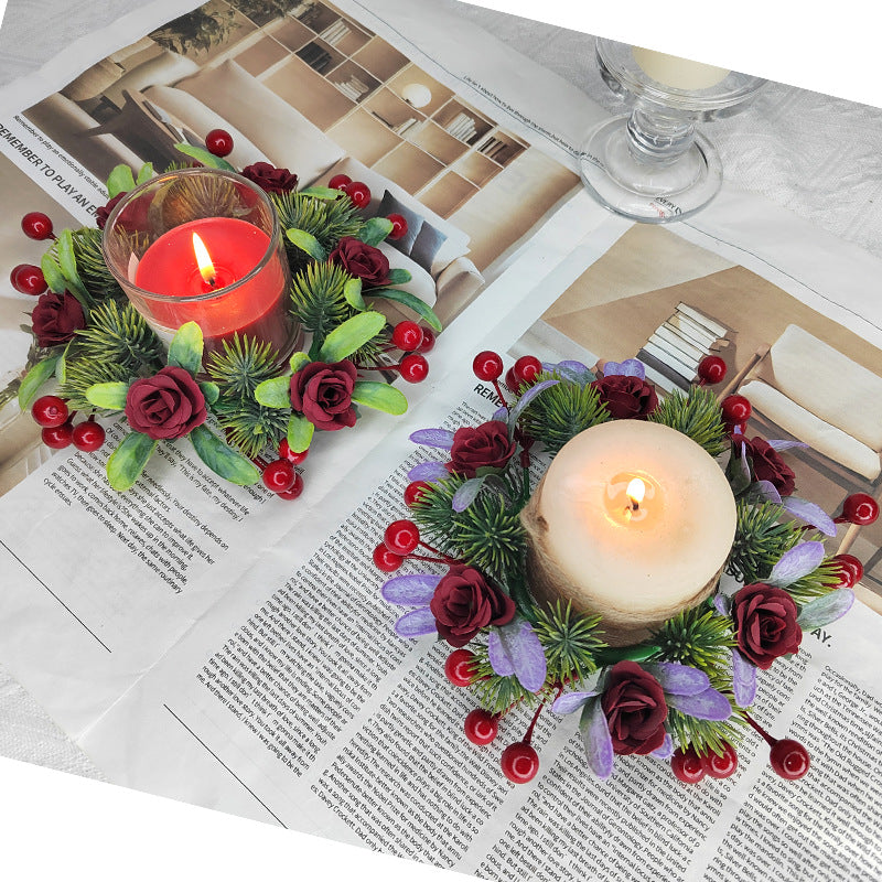 Christmas candle wreath with roses and pine needles