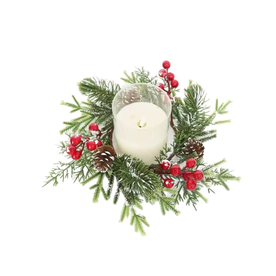 Christmas candle wreath with pine needles and berries
