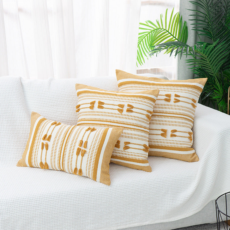 Woven decorative cushion cover with ordered tassel application and structured jacquard weaving Bowlift