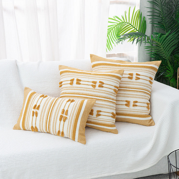 Woven decorative cushion cover with ordered tassel application and structured jacquard weaving Bowlift