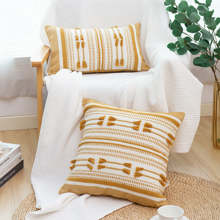 Woven decorative cushion cover with ordered tassel application and structured jacquard weaving Bowlift