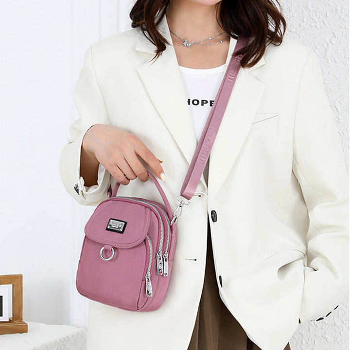 Water-Resistant Crossbody Phone Bag with Multiple Pockets and Adjustable Strap