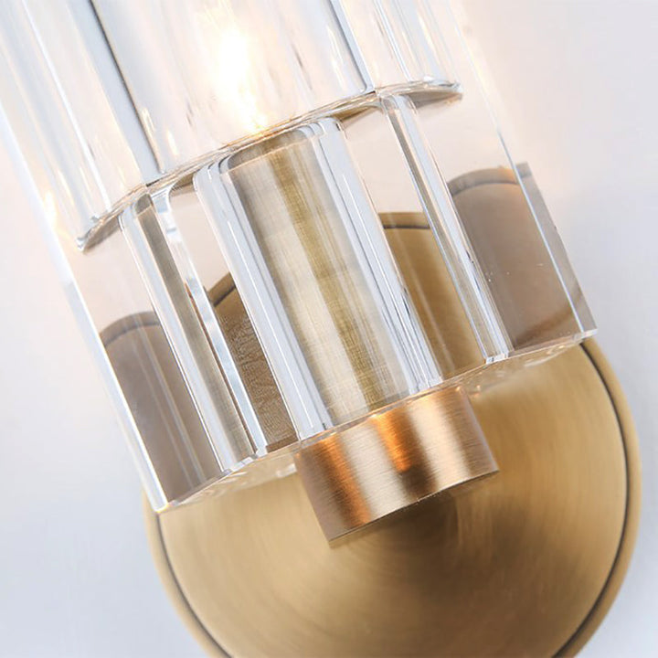 BowLift | Cylinder Clear Crystal Wall Lamp Modernist 1 Light Wall Sconce with Round Backplate in Brass