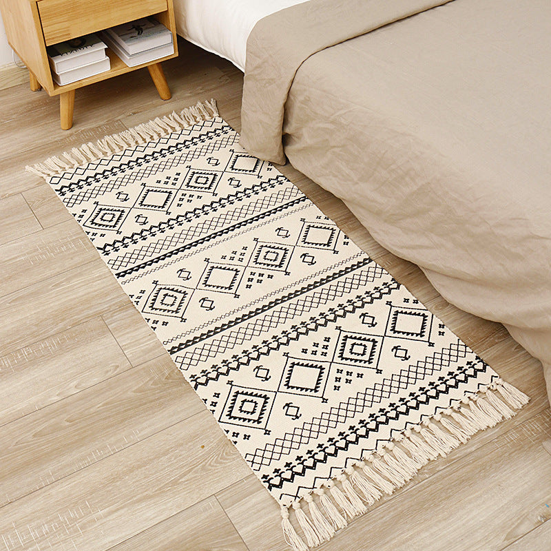 Flat-woven cotton runner with graphic stripe pattern and fringes Bowlift