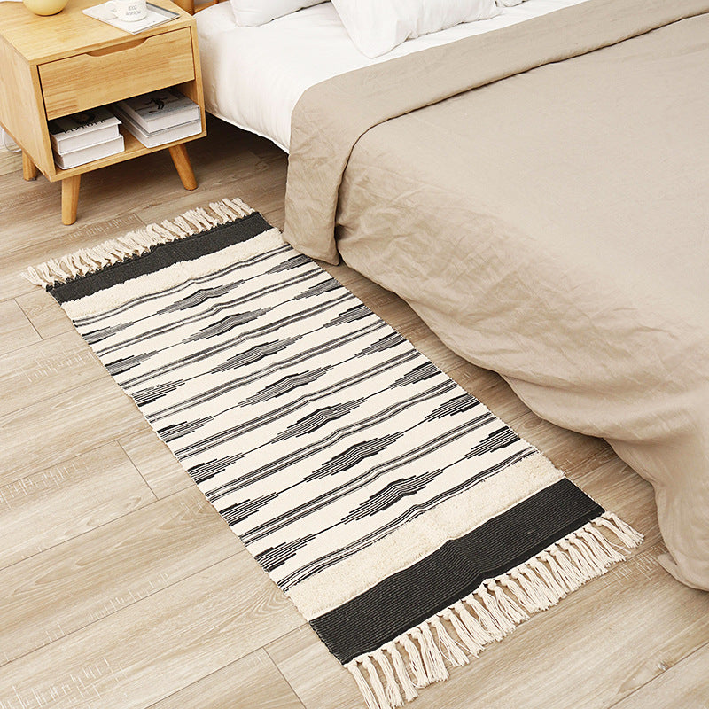 Flat-woven cotton runner with graphic stripe pattern and fringes Bowlift