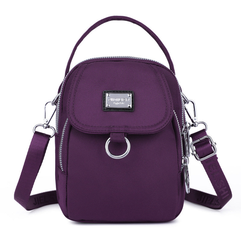 Water-Resistant Crossbody Phone Bag with Multiple Pockets and Adjustable Strap