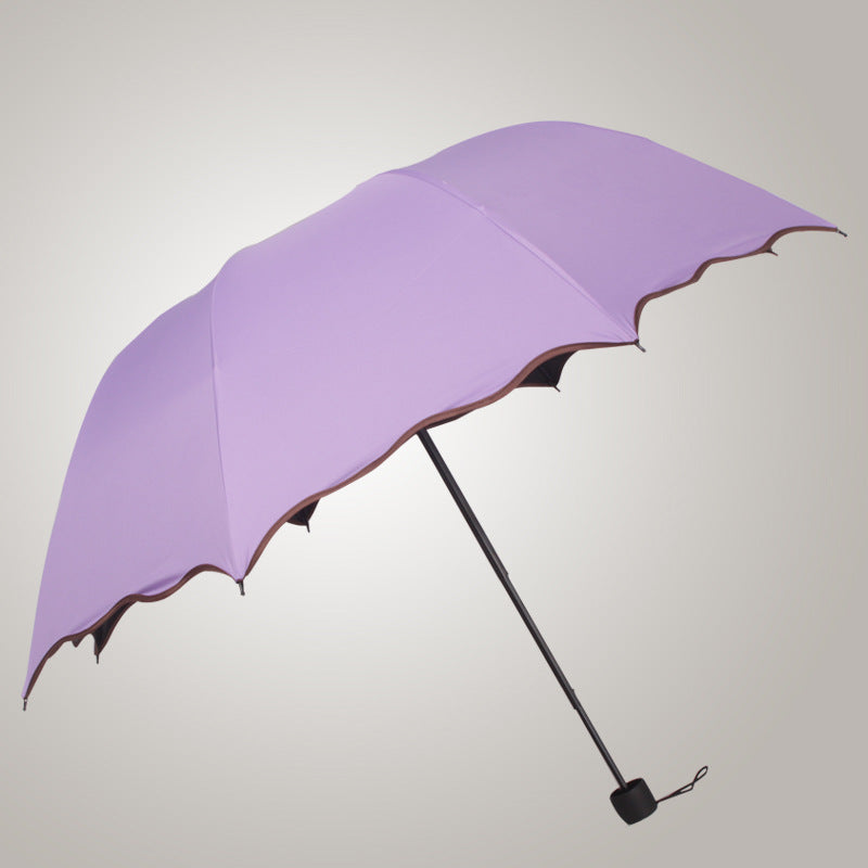 Women’s creative folding umbrella with elegant wave Bowlift