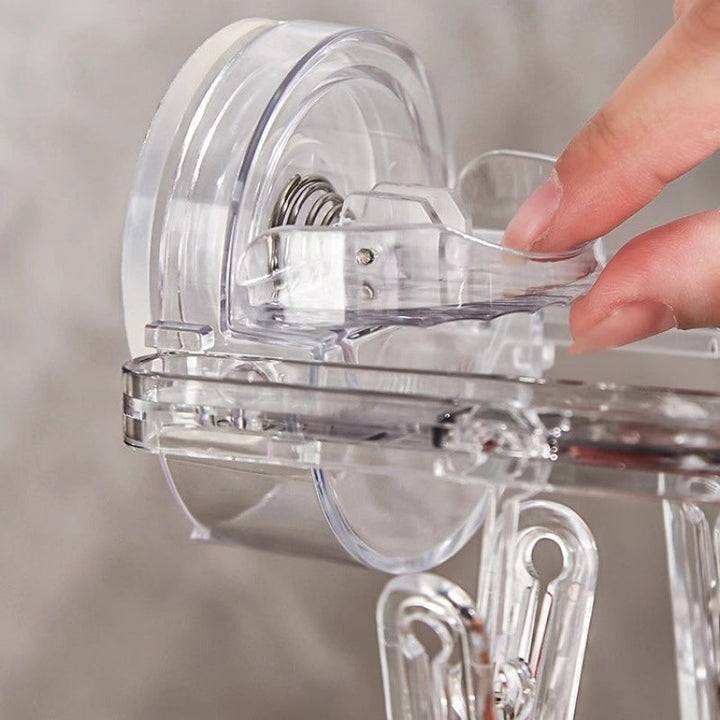 BowLift | Suction cup collapsible clothes hanger with clip