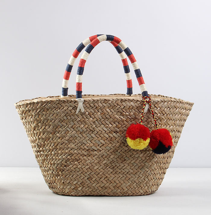 Braided beach bag with decorative pompons Bowlift