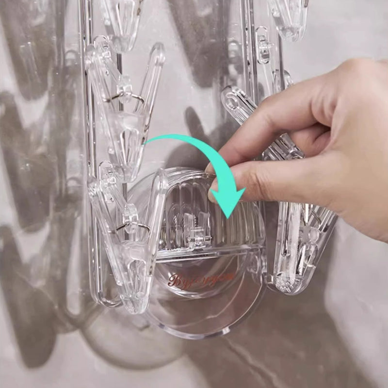 BowLift | Suction cup collapsible clothes hanger with clip