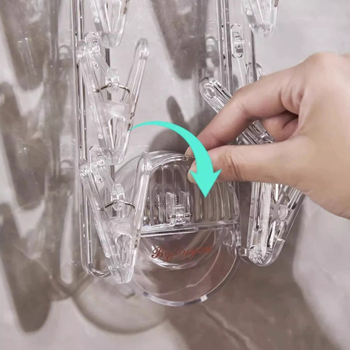 BowLift | Suction cup collapsible clothes hanger with clip