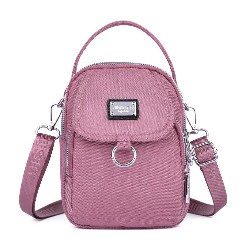 Water-Resistant Crossbody Phone Bag with Multiple Pockets and Adjustable Strap