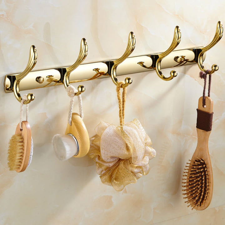 BowLift | Contemporary brushed brass bathroom accessories as a single piece or as a set