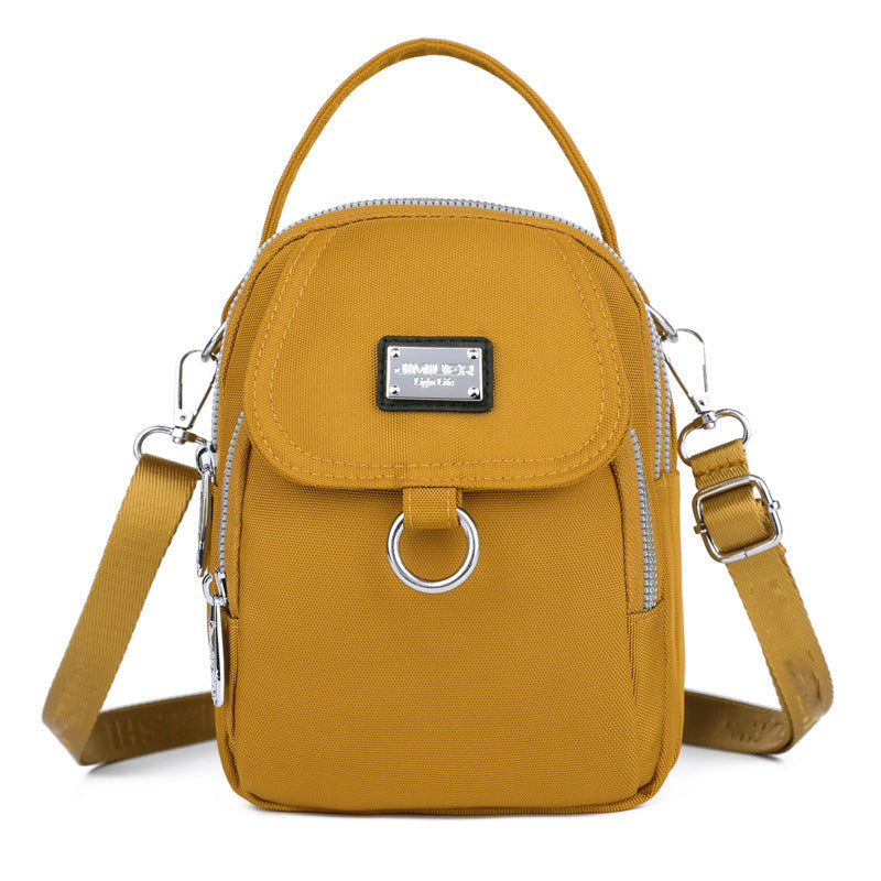 Water-Resistant Crossbody Phone Bag with Multiple Pockets and Adjustable Strap