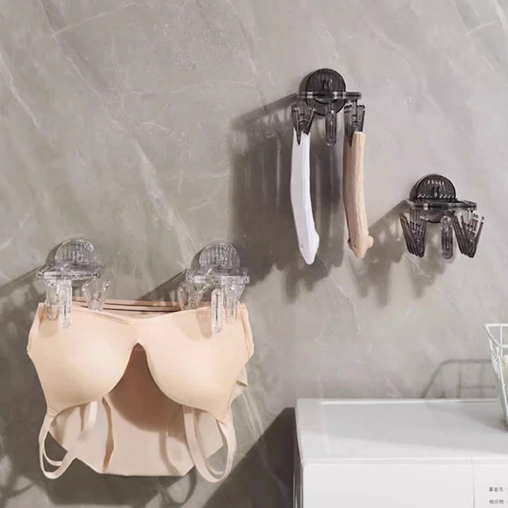 BowLift | Suction cup collapsible clothes hanger with clip