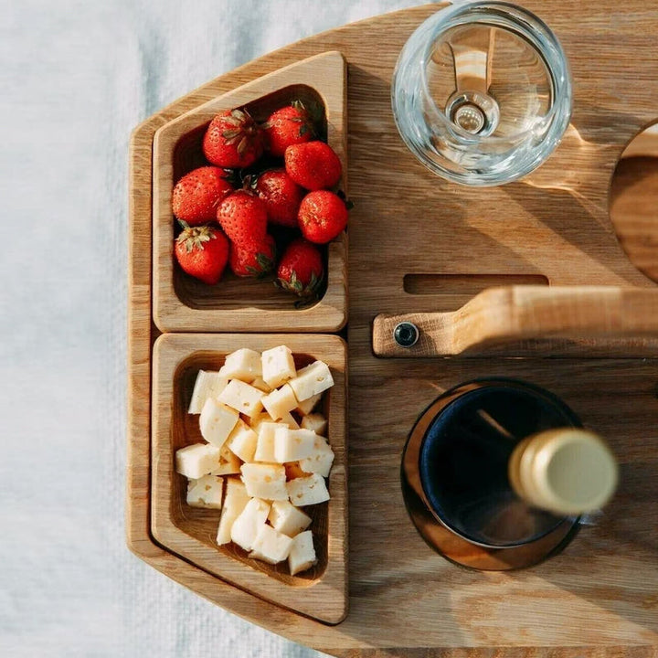 BowLift | Compact picnic table with wooden bottle holder