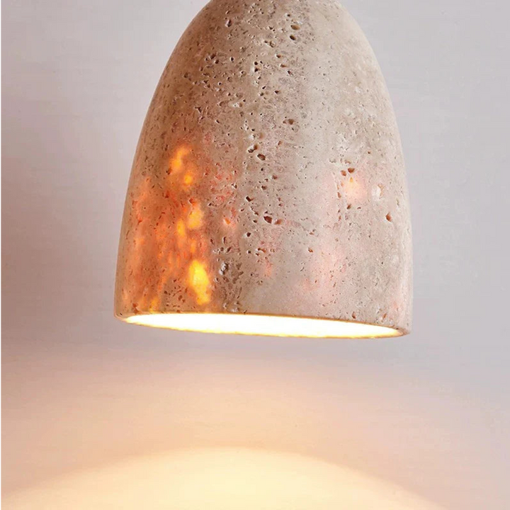 BowLift | TerraLume – Pendant light with natural stone texture and warm glow