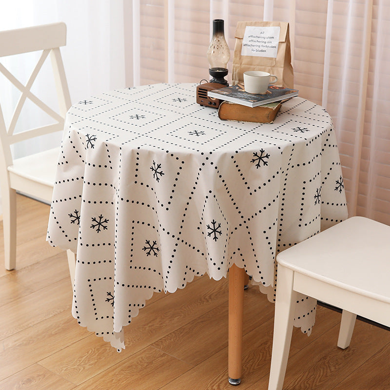 Wipeable tablecloth with fine check pattern, wavy hem and easy-care PVC finish Bowlift