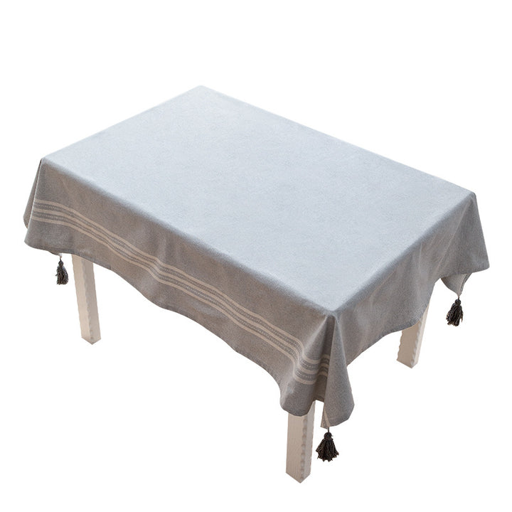 Rectangular linen look tablecloth with fringed tassels and side stripe border design Bowlift