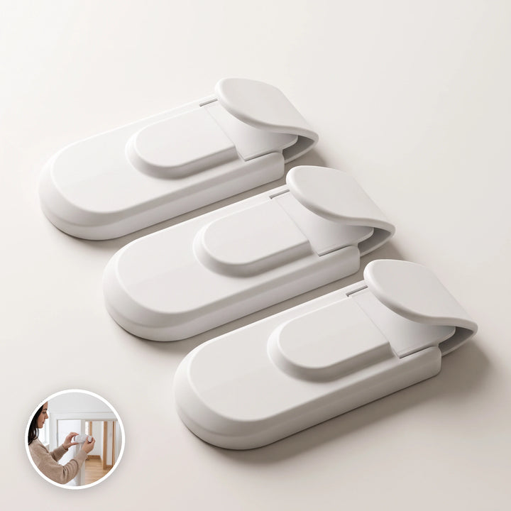 Three-pack of white child safety door locks