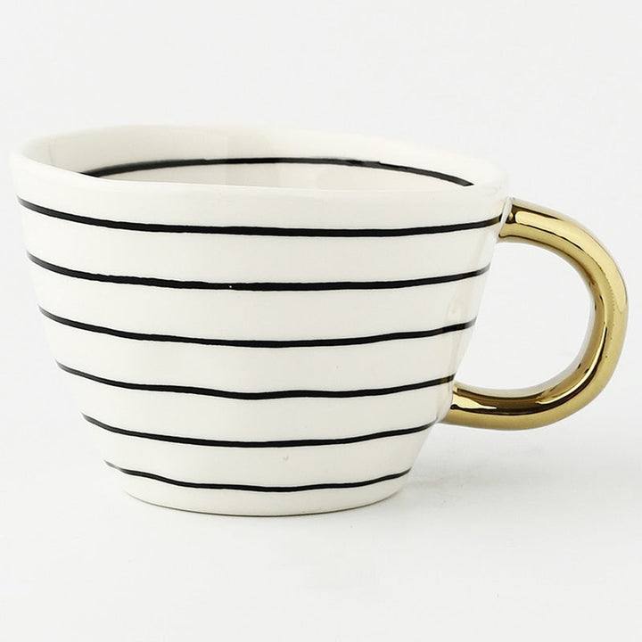 BowLift | Cup with abstract geometric pattern and gold handle