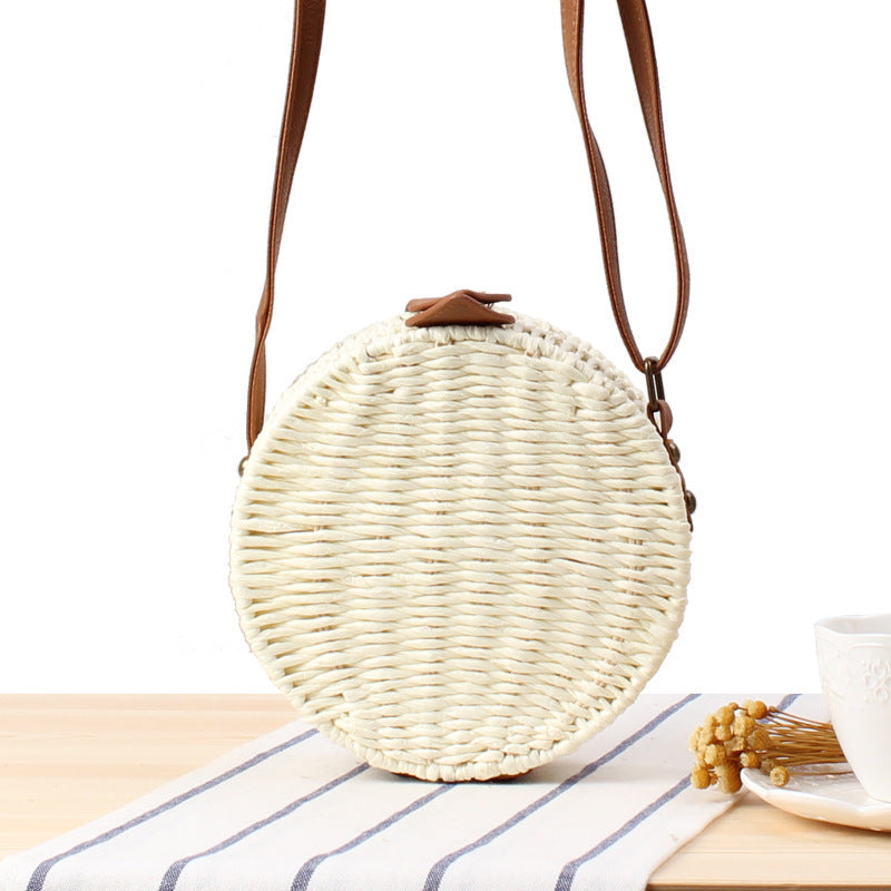 Round basket bag with leather accents Bowlift