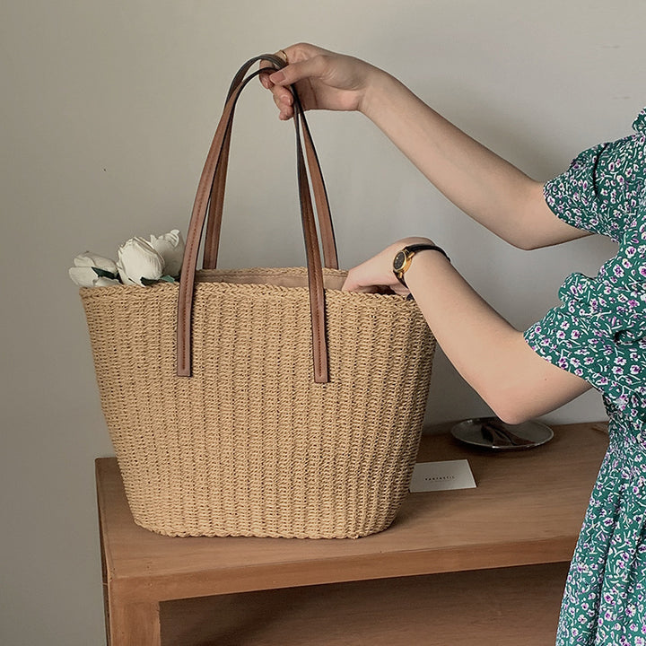 Spacious straw bag with sustainable leather handles Bowlift