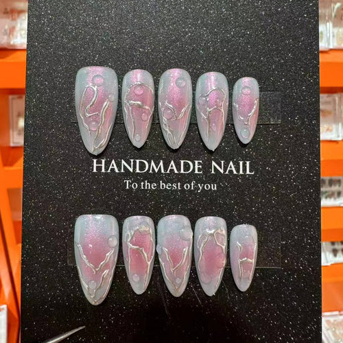 Artistic Press-On Nail Art Set with Charming Metallic Designs