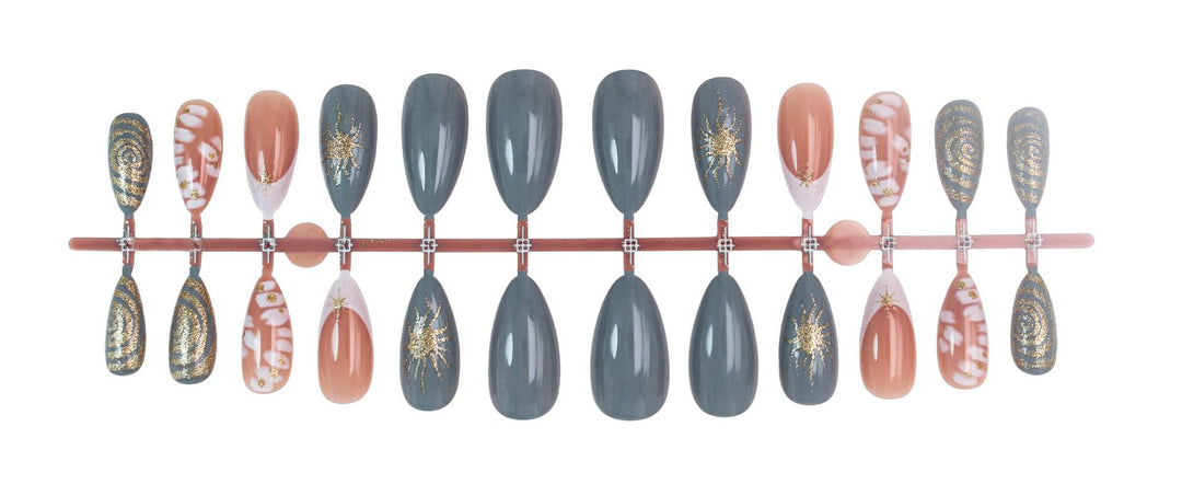 Nail art set with elegant gold accents and creative design Bowlift