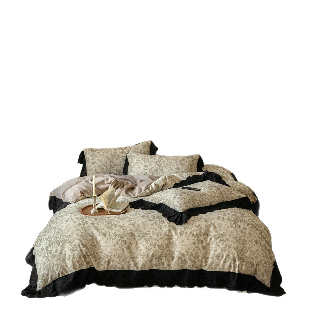 Bedding set with floral toile design and black ruffle