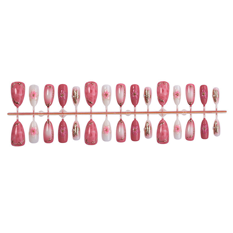 Artificial nail art with floral and glamorous designs Bowlift
