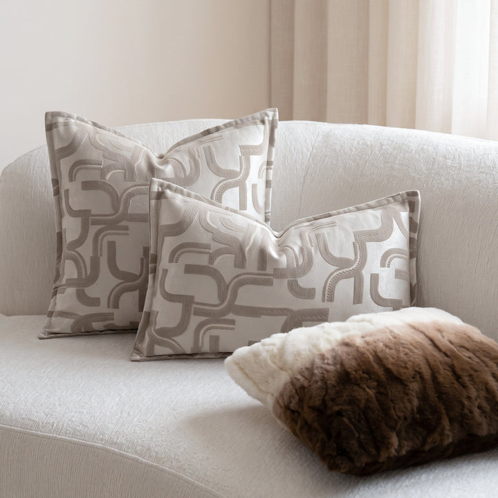 Woven decorative pillow with elegant pattern