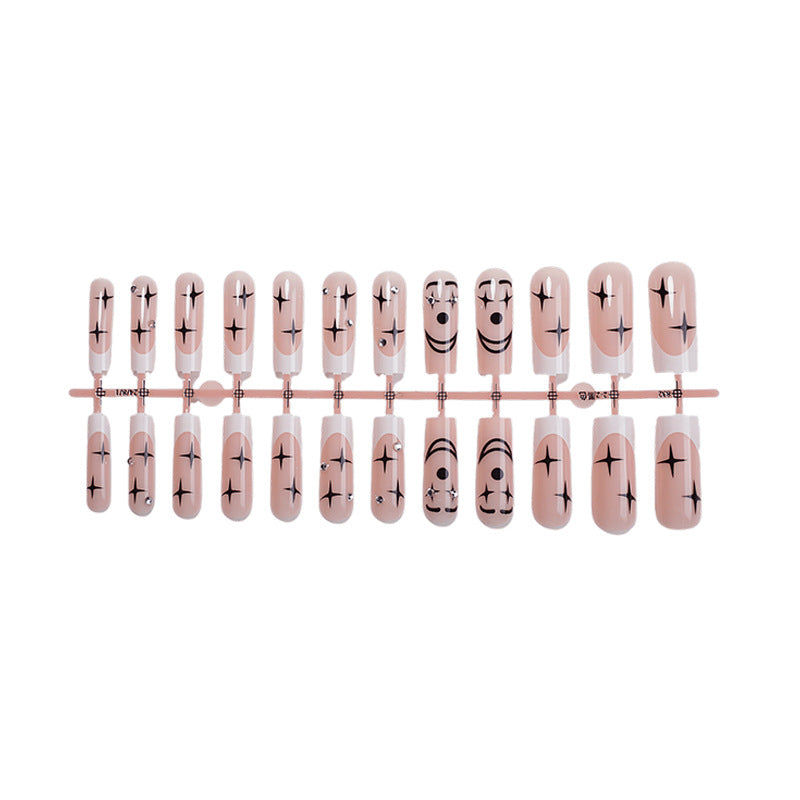 Artistic Press-On Nail Set with Unique Star and Graphic Designs Bowlift