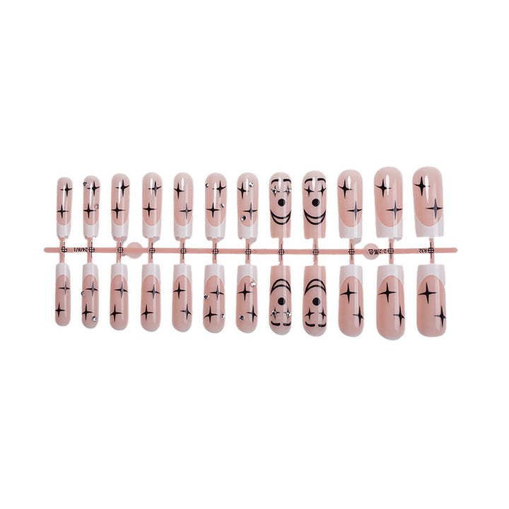 Artistic Press-On Nail Set with Unique Star and Graphic Designs Bowlift