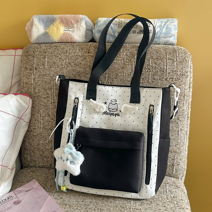 Stylish Dot-Printed Backpack with Decorative Accents Bowlift
