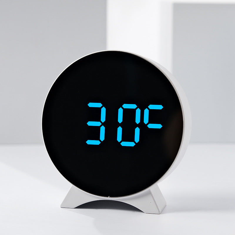 Digital alarm clock with large LED display and adjustable light sensor Bowlift