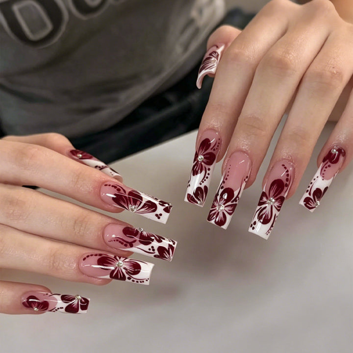 Nail set with elegant floral and ombre designs Bowlift