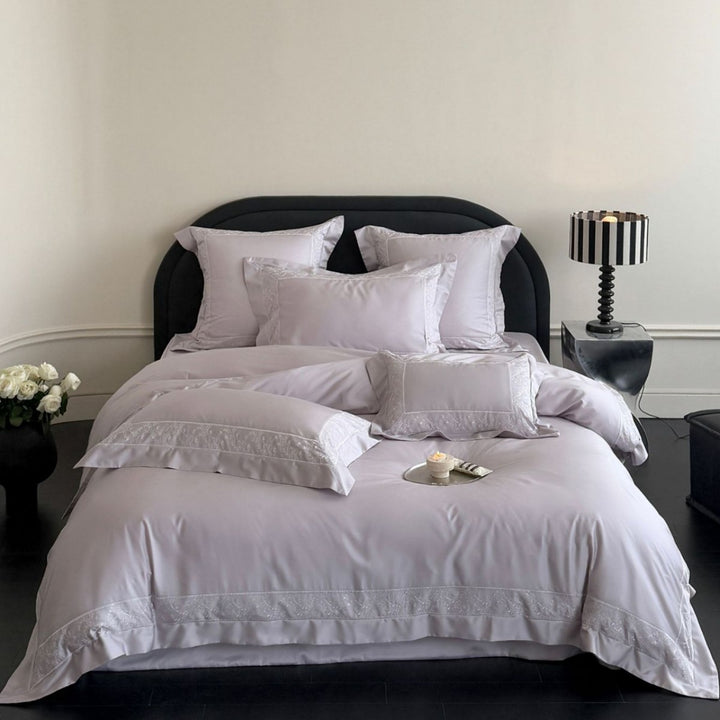 Elegant cotton satin bedding set with delicate lace trim