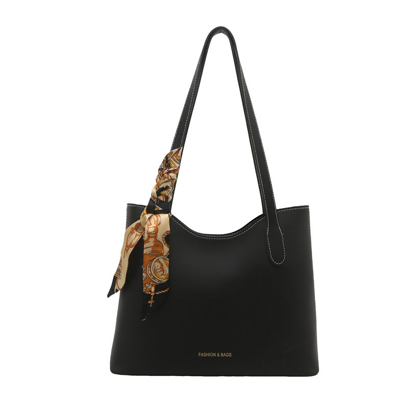 Elegant Structured Tote Handbag with Decorative Scarf