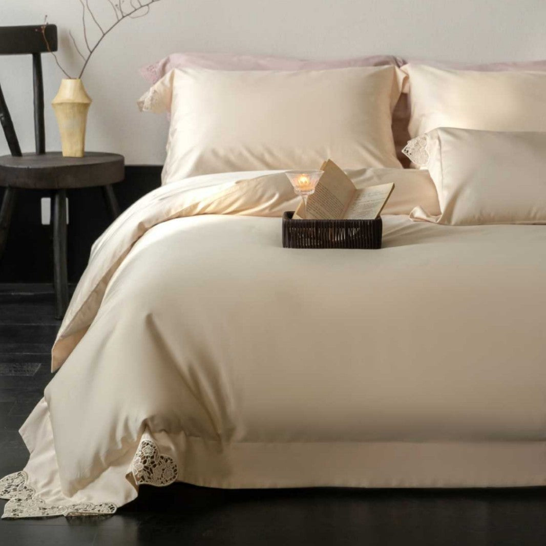 Satin bedding set with lace heart appliqué