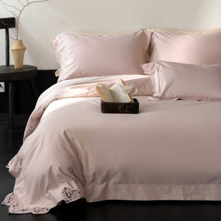 Satin bedding set with lace heart appliqué
