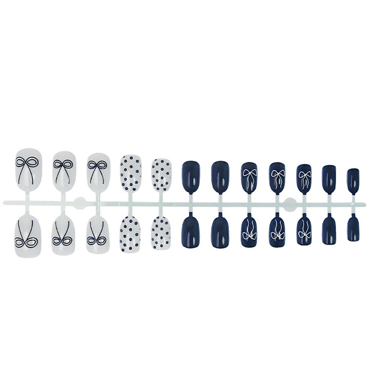 Nail set with stylish bows and dots Bowlift