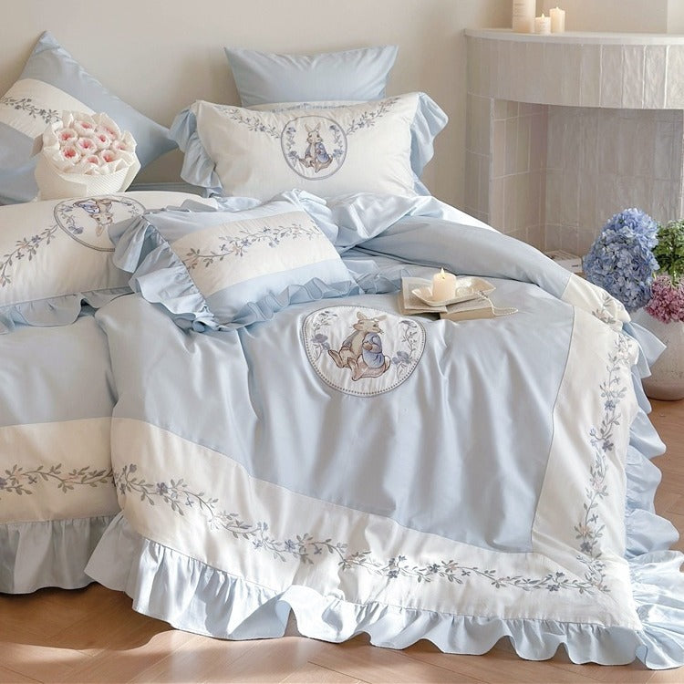 Bedding set with romantic ruffle edge and delicate embroidery