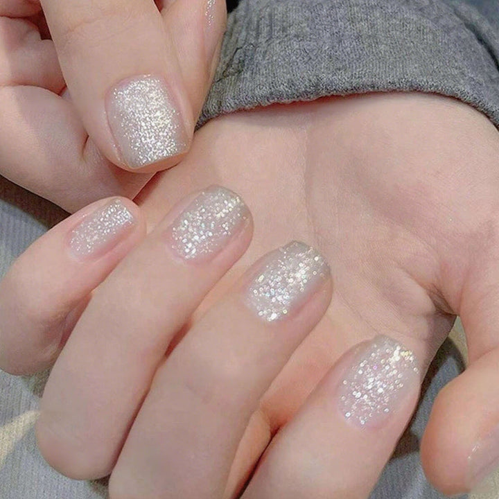 Glittering artificial nails in elegant ombre style Bowlift