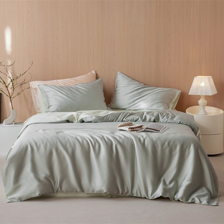 Luxurious cotton satin bedding set with a silky-matte feel, reversible function, and fine piping