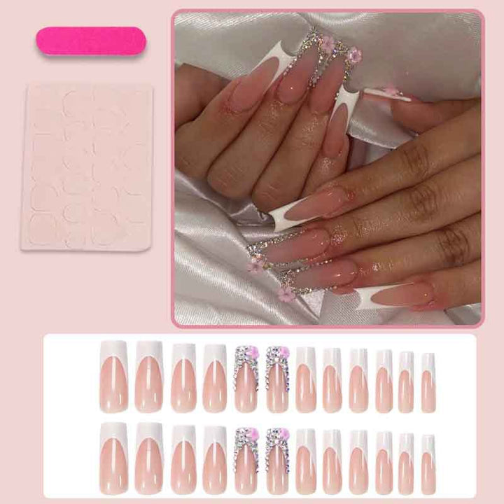 Art nail set with elegant glitter and floral accents Bowlift